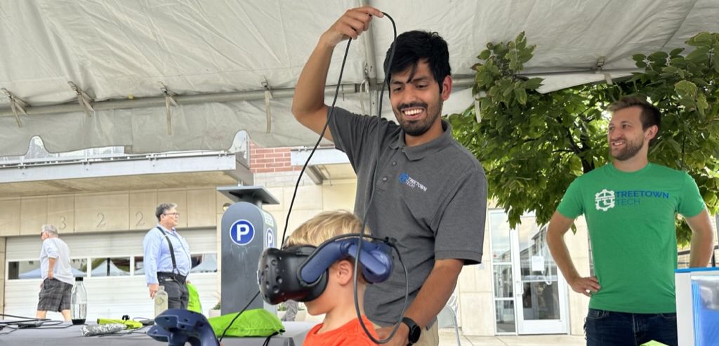 Young boy views Treetown Tech's work through VR