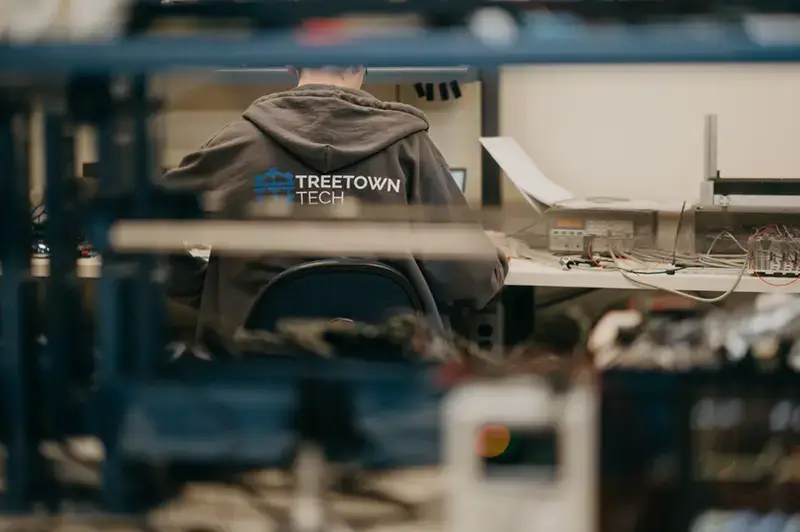 A Treetown Tech employee working on a project