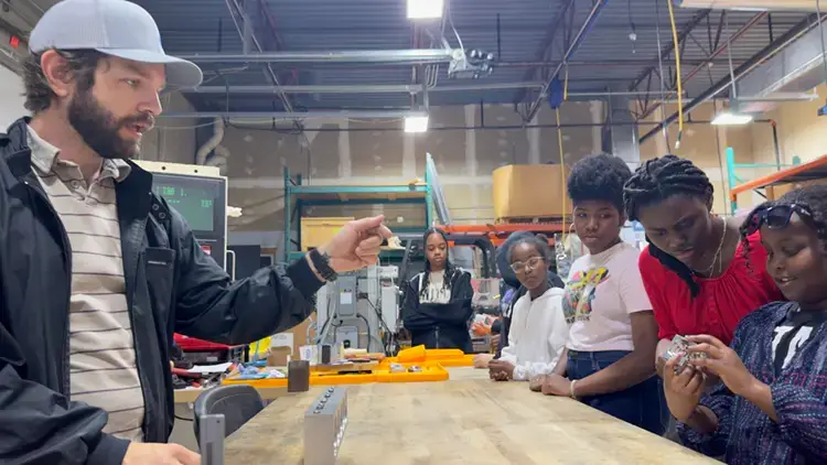 Girls group learning from Treetown Tech