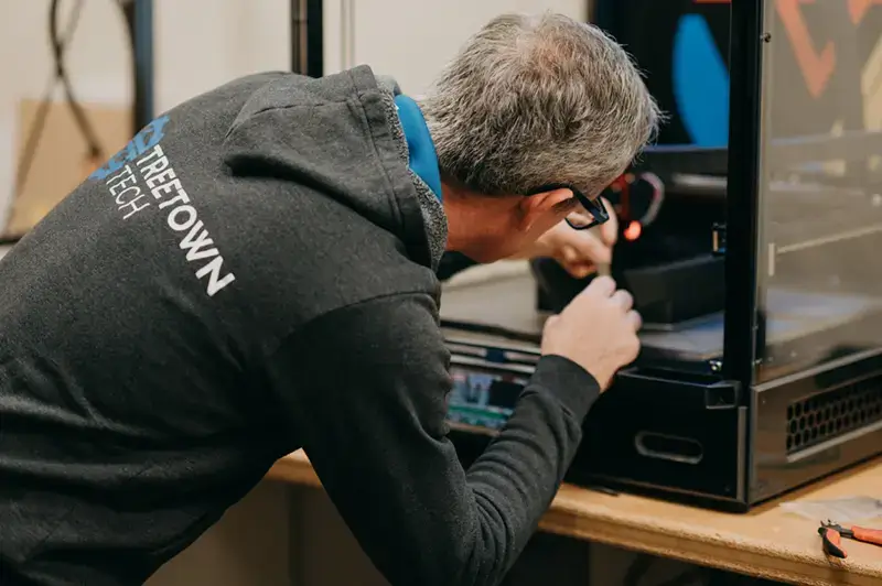 Treetown Tech employee working on product