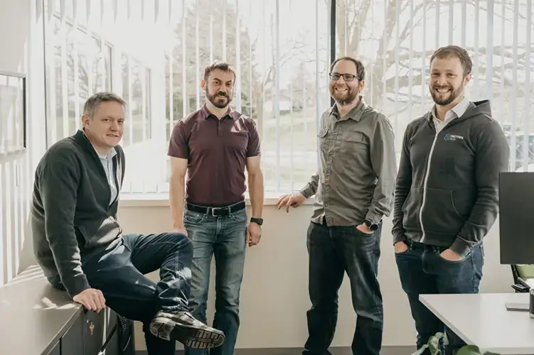 A group of Treetown Tech employees in the office