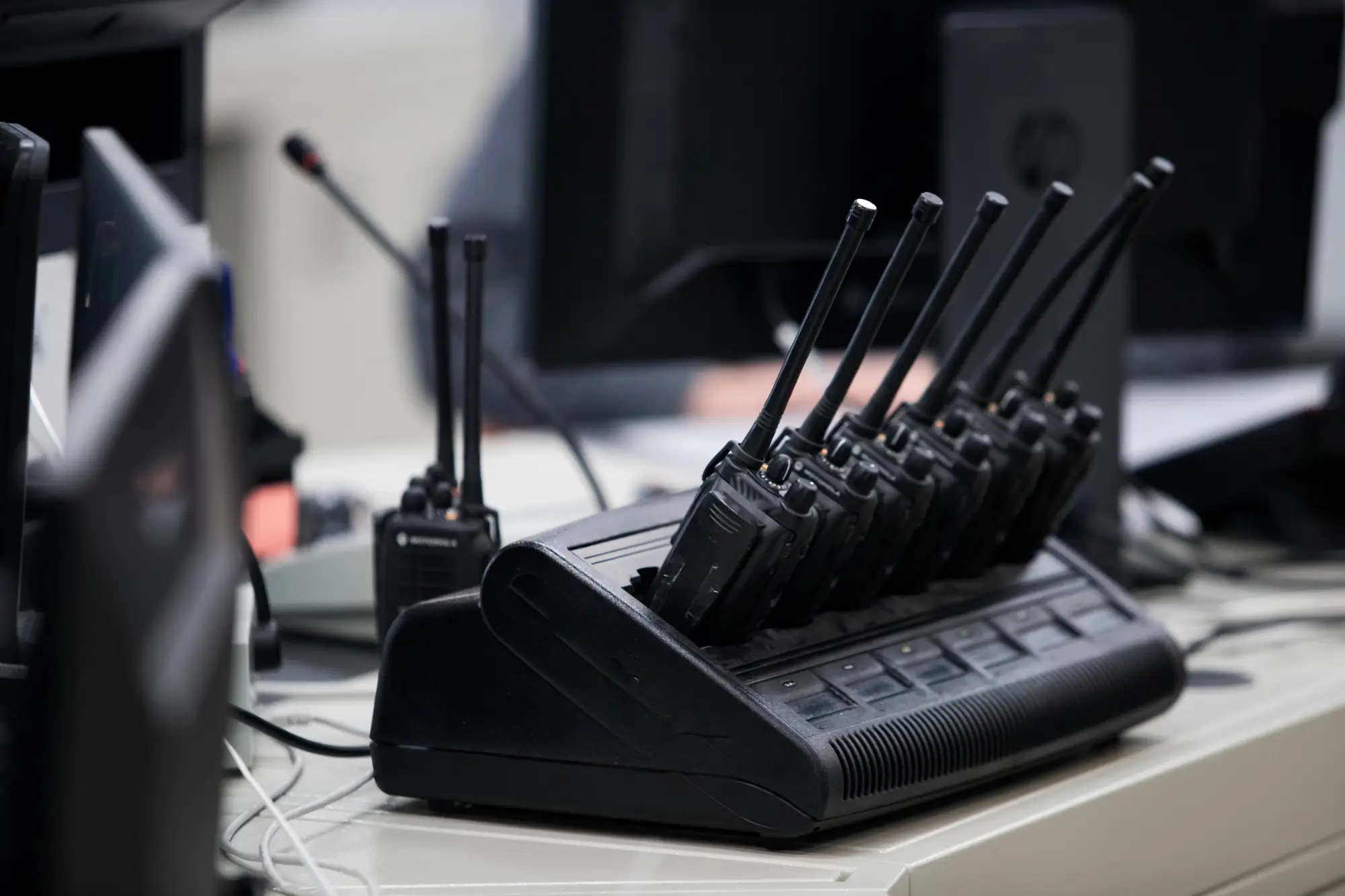 Walkie talkies in a charging station